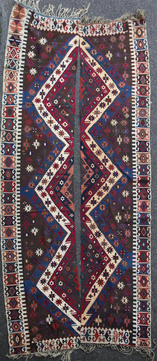 Two Kelim wall hangings, approx. 12ft 8in by 2ft 7in.